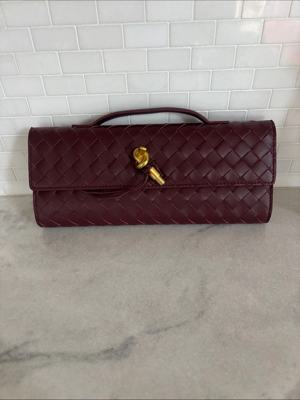 Woven  Burgundy Clutch with Gold Accent